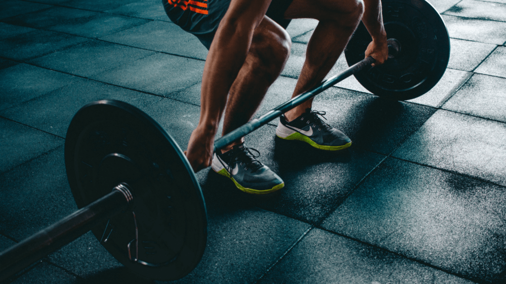 Person holding barbell