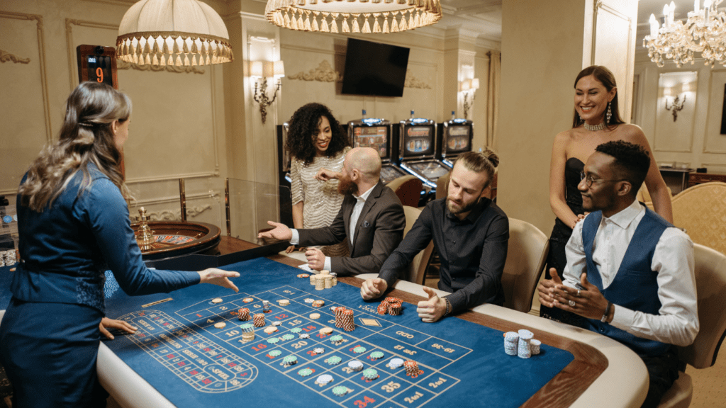 Group of Gamblers playing on roulette table